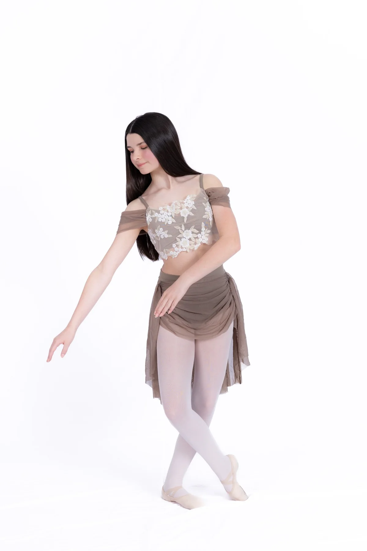 Dancer in a graceful ballet-inspired pose
