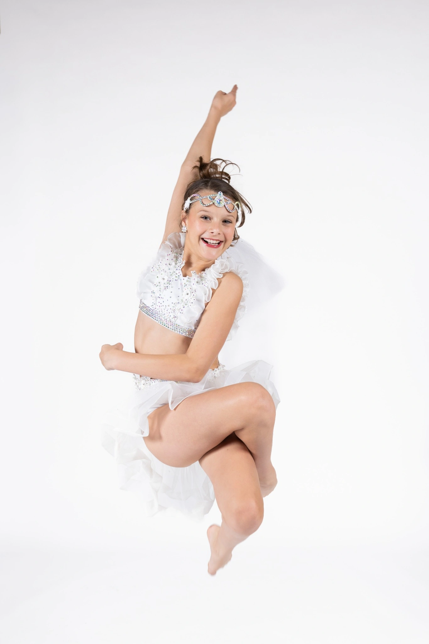 Teen dancer in a purple and navy costume